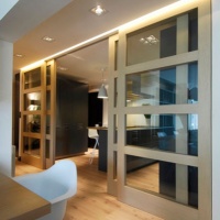 Diseño puertas correderas para salón en Araba por SuBe Susaeta Interiorismo